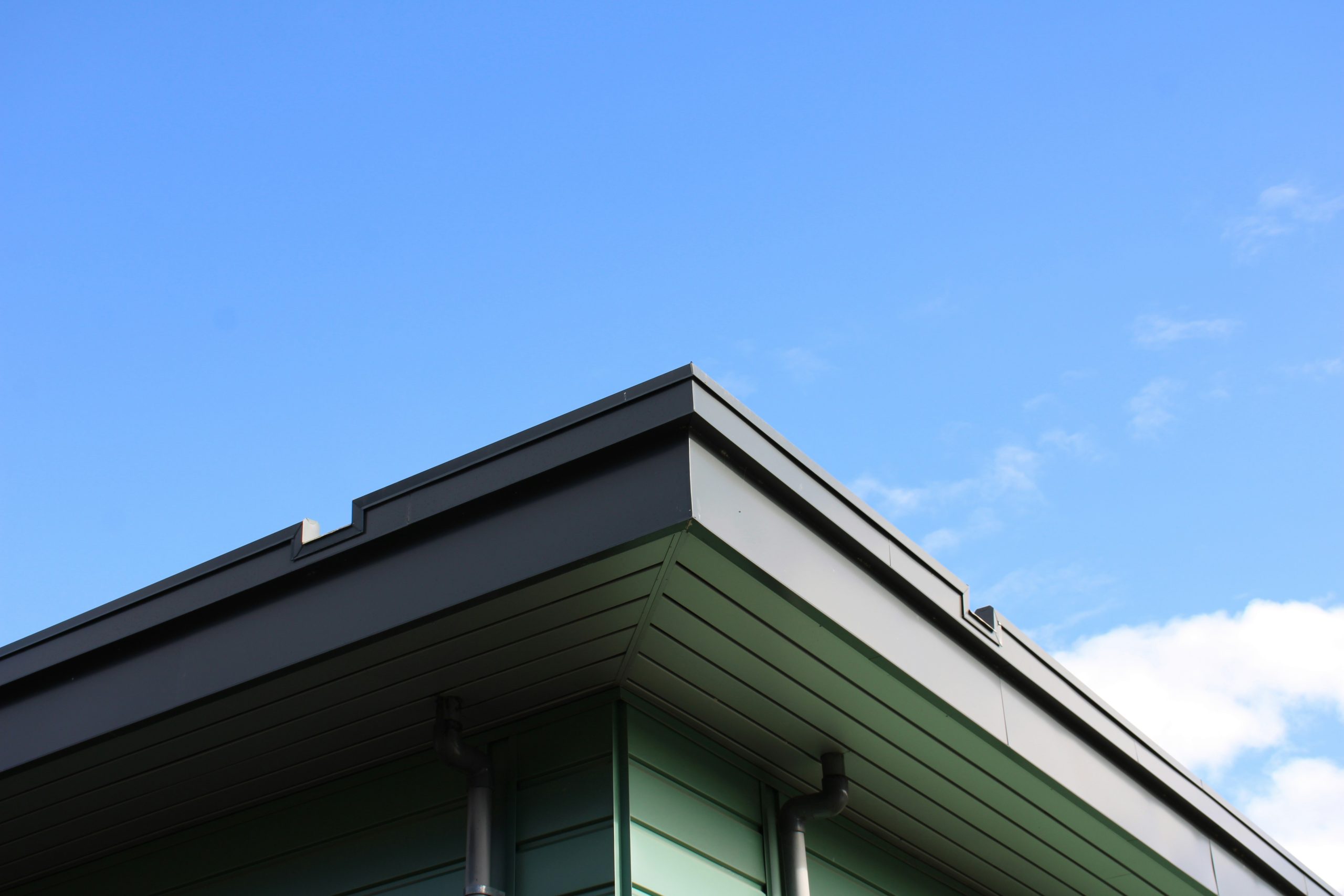 Picture of a home's fascia with blue sky behind it. Fascia is a top appraisal issue I see!