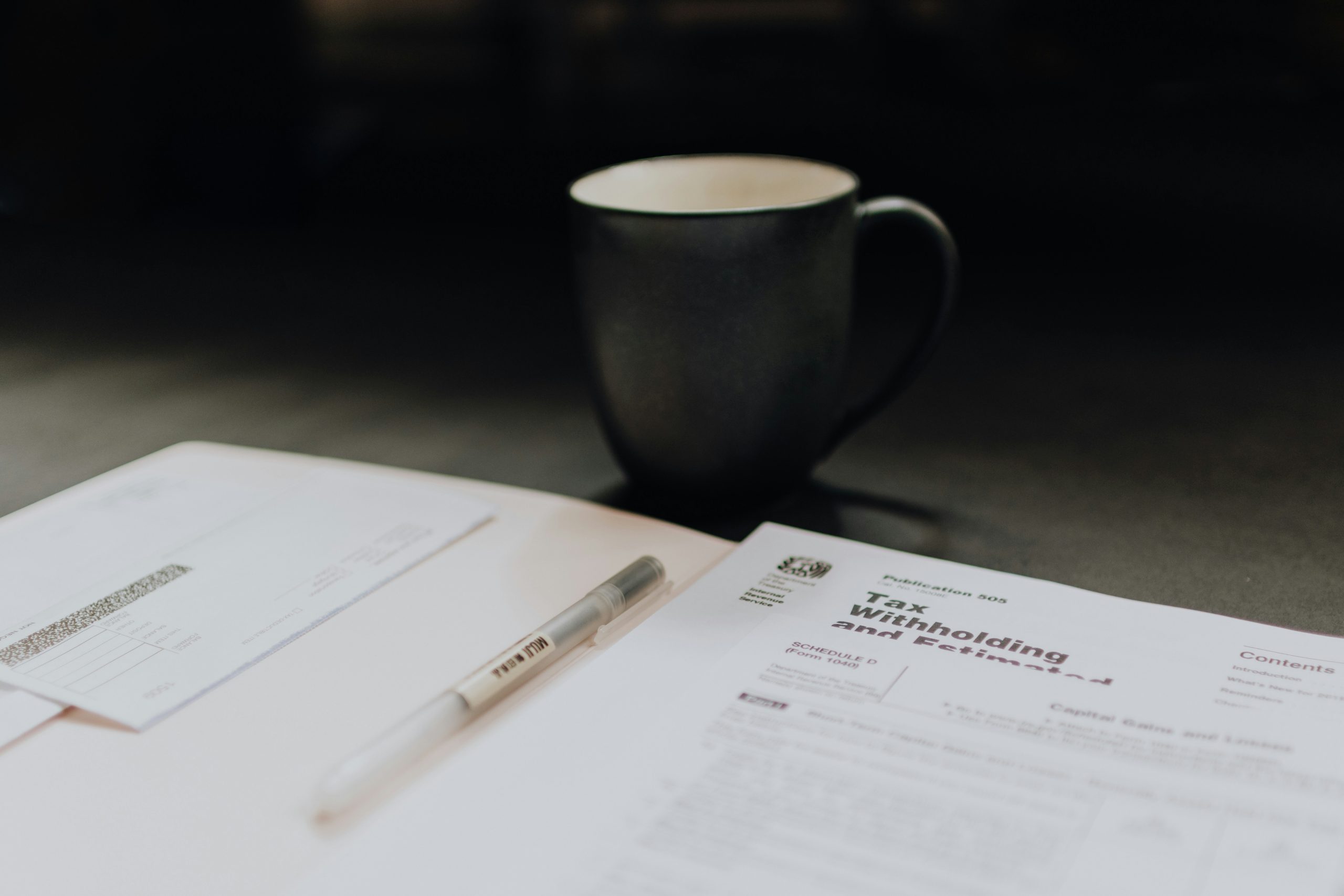 FIRPTA stands for the Foreign Investment in Real Property Tax Act of 1980. This is a stock photo of tax withholding forms.